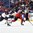 BUFFALO, NEW YORK - DECEMBER 27: Slovakia's Samuel Fereta #27 and Canada's Taylor Raddysh #16 chase down a loose puck during preliminary round action at the 2018 IIHF World Junior Championship. (Photo by Matt Zambonin/HHOF-IIHF Images)

